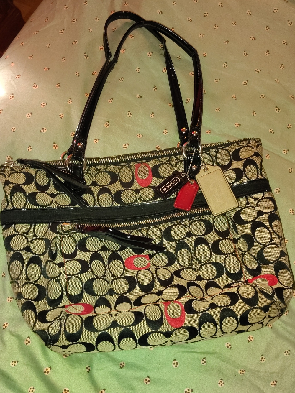 Coach Canvas Tote with Black Trim and Red Accent